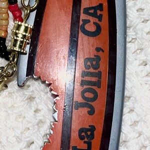 Purse fob from San Diego shark and surf board